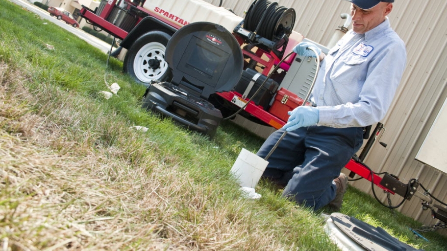Septic tank worker on the job